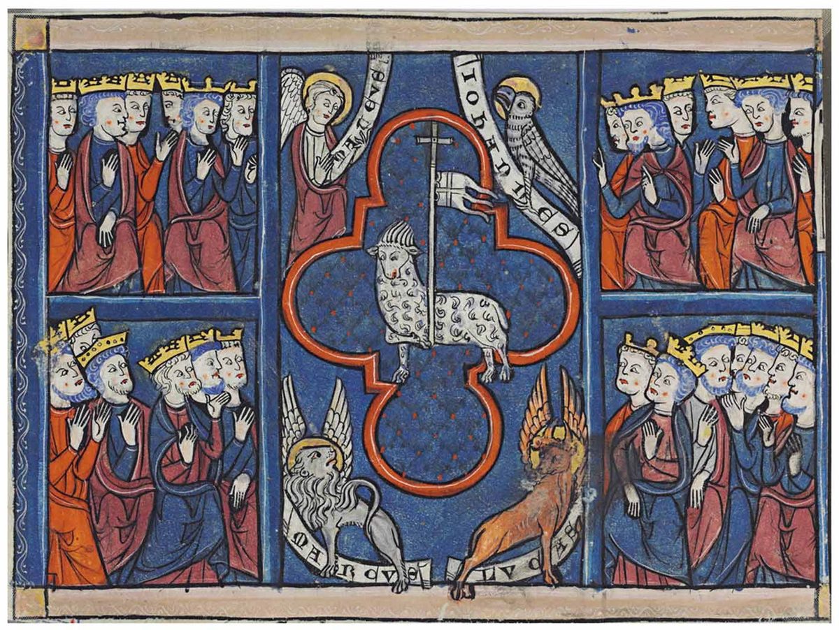 An illuminated manuscript page on vellum. At the center, inside a red quatrefoil frame, a white horned lamb stands beside a tall staff topped with a cross. In the four lobes around it are the four winged evangelist symbols: a haloed angel labeled MATHEUS at upper left, holding a scroll and offering a small book toward the lamb; a haloed eagle labeled IOHANNES at upper right; a haloed lion labeled MARCUS at lower left; and a winged ox labeled LUCAS at lower right. Four rectangular panels fill the corners of the page, each showing six crowned, richly robed elders with hands raised in prayer, twenty-four figures in total.