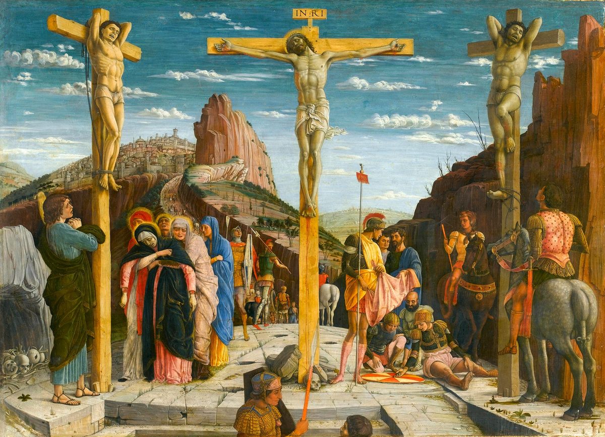 Three crosses on a paved rock platform. Jesus at the centre, the two bandits tied by the wrists to bare timbers at either side, one of them twisting round. At the left a group of women, one in dark blue collapsing into the arms of the others; a young man in blue-green stands apart at the far edge, looking away. At the lower right, soldiers sit and sprawl on the pavement casting lots on a round shield while another holds up a rose-coloured garment. Mounted soldiers wait at the right. Skulls and bones lie at the foot of the left-hand cross. Behind, a road winds down from a walled city on a hill, crowded with small figures.