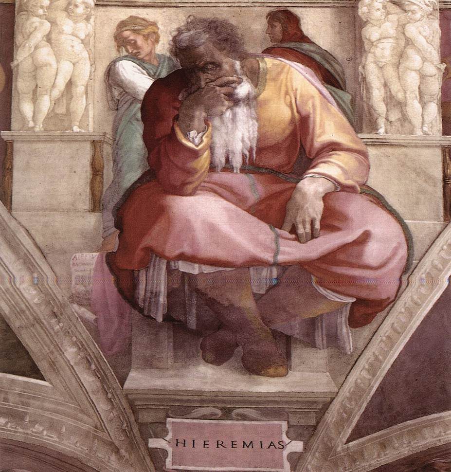 An elderly, bearded prophet sits slumped forward in thought, his chin pressed into his knuckles and his white beard spilling over his hand, wrapped in heavy orange and rose-pink robes, beneath a Latin nameplate reading HIEREMIAS and flanked by carved stone putti and the fresco's own painted architecture