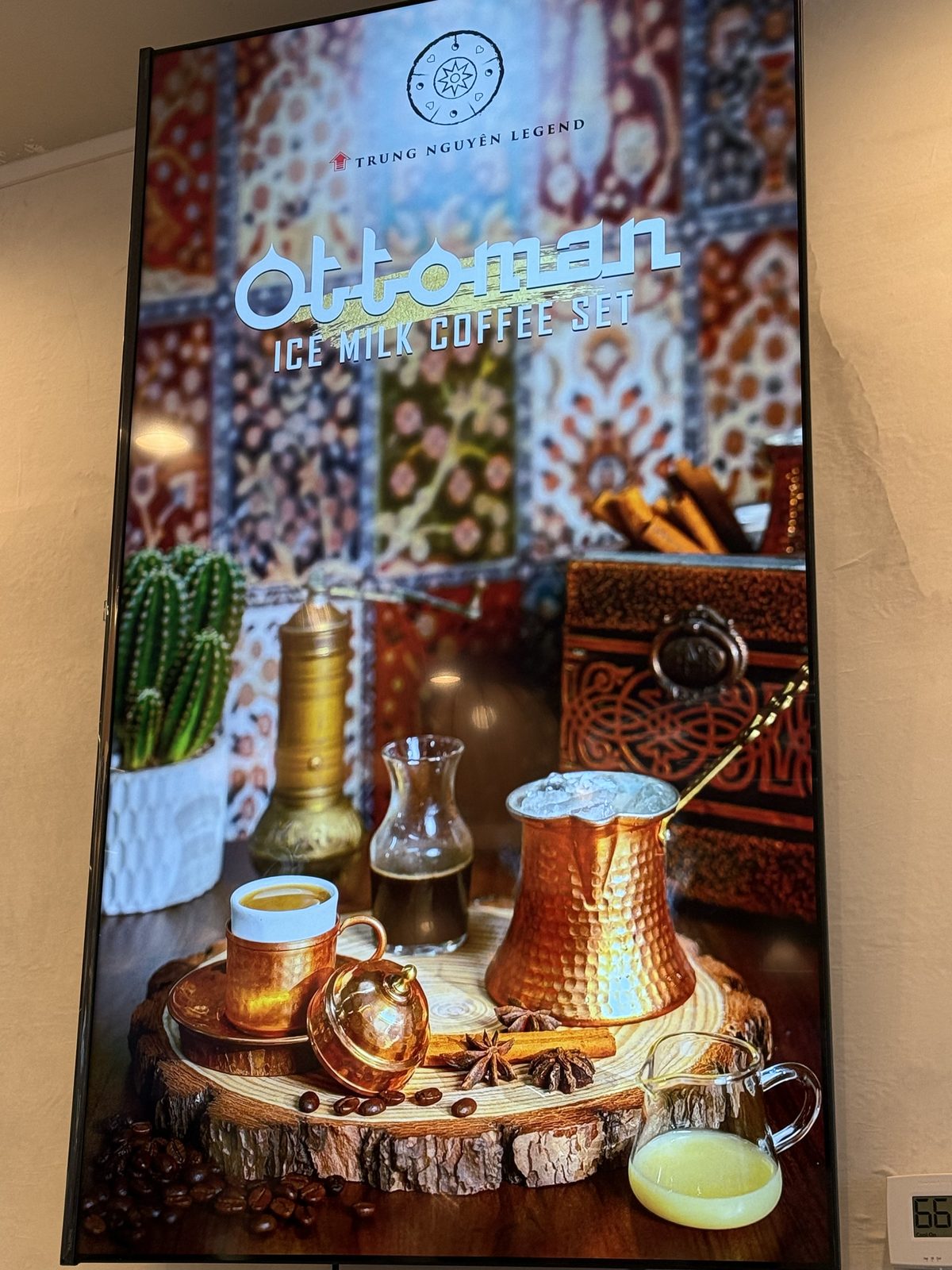 Digital menu board for the Ottoman Ice Milk Coffee Set, a hammered copper cezve and cup on a Turkish-carpet backdrop
