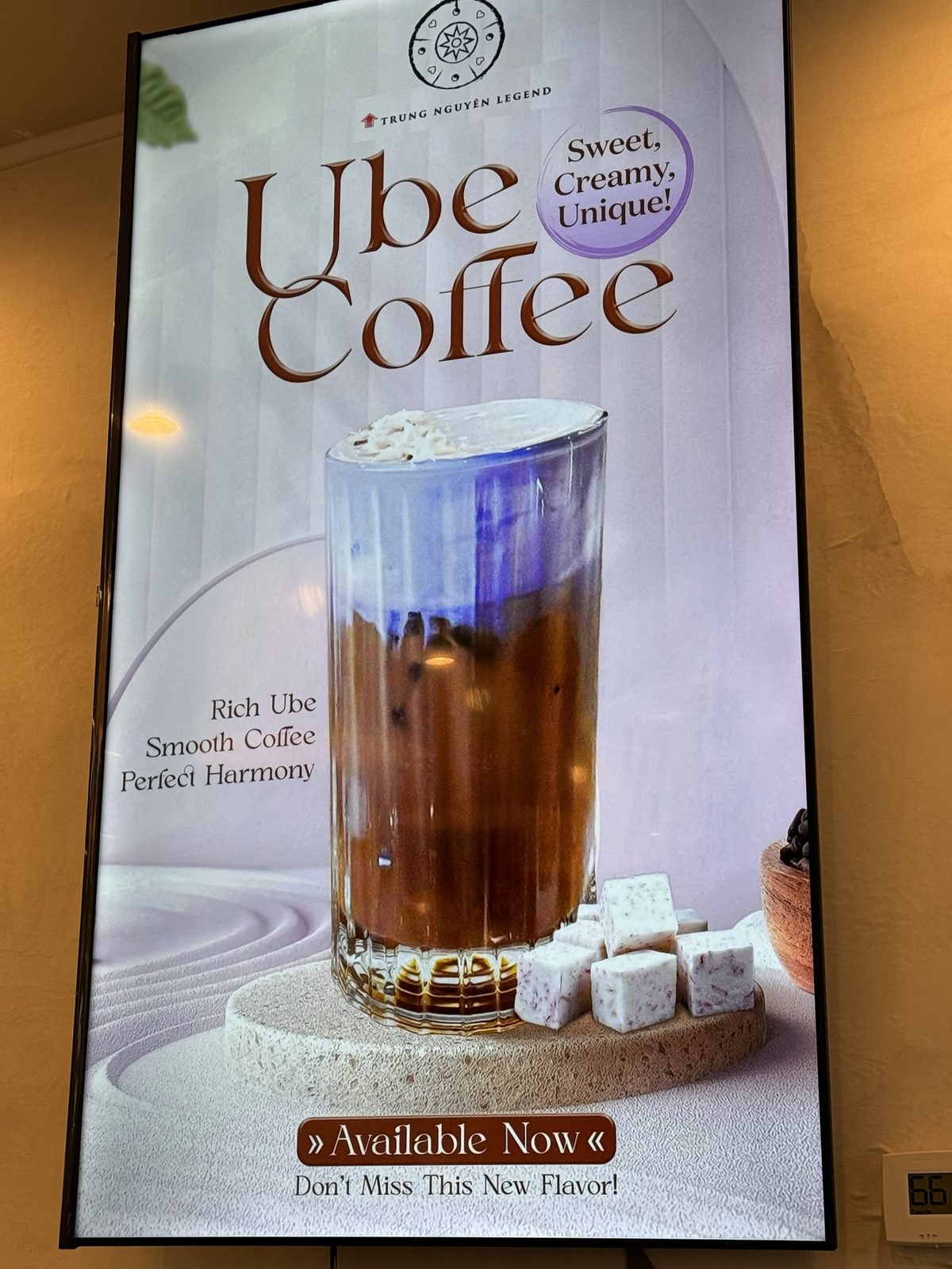 Digital menu board for Ube Coffee, a purple-topped iced coffee next to cubes of purple ube halaya